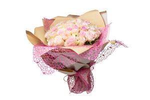 A bouquet of pink and white flowers wrapped in paper with a pink ribbon and decorative netting.